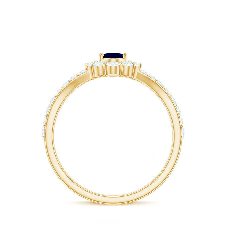Blue sapphire and diamond chevron ring with 1.25 carats oval cut gemstone by Rosec Jewels, showcasing elegant jewelry design.