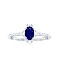 Natural 0.6 carat blue sapphire oval engagement ring with diamond accents from Rosec Jewels, showcasing a elegant gemstone setting.