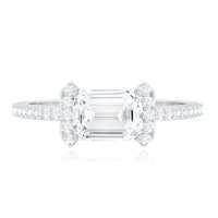 Rosec Jewels 1.7 Carat Cubic Zirconia emerald cut east-west engagement ring showing the sparkling center stone and sleek band.