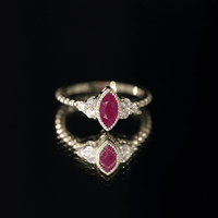 Vintage Style 0.75 Carat Ruby Marquise Engagement Ring with Diamond Trio