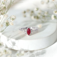 Vintage Style 0.75 Carat Ruby Marquise Engagement Ring with Diamond Trio