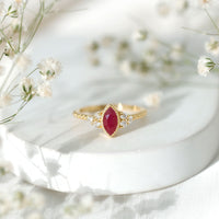 Vintage Style 0.75 Carat Ruby Marquise Engagement Ring with Diamond Trio