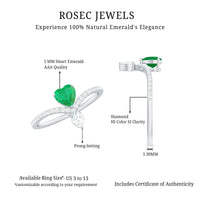 Elegant emerald heart engagement ring with diamond accents from Rosec Jewels, showcasing a detailed design and sparkling gemstones.
