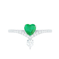 Rosec Jewels emerald heart engagement ring with diamond, featuring a detailed design and sparkling gemstone setting.