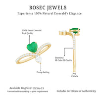 Rosec Jewels designer emerald heart engagement ring with diamond, showcasing the intricate band and sparkling gemstone details.