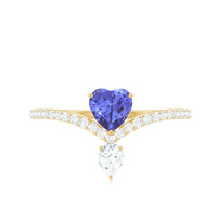 Heart-shaped Tanzanite engagement ring with diamond accent by Rosec Jewels, featuring a chevron band design.