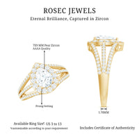 Pear-shaped cubic zirconia engagement ring with split shank design by Rosec Jewels, showcasing a sparkling center stone and elegant band.