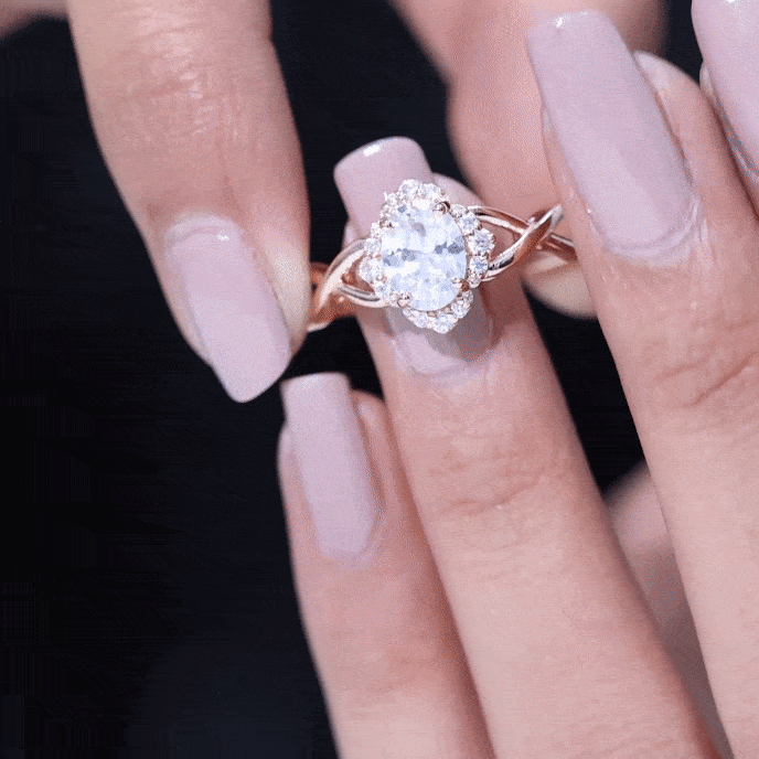 1.2 Carat Oval Cubic Zirconia Flower Engagement Ring in Crossover Shank