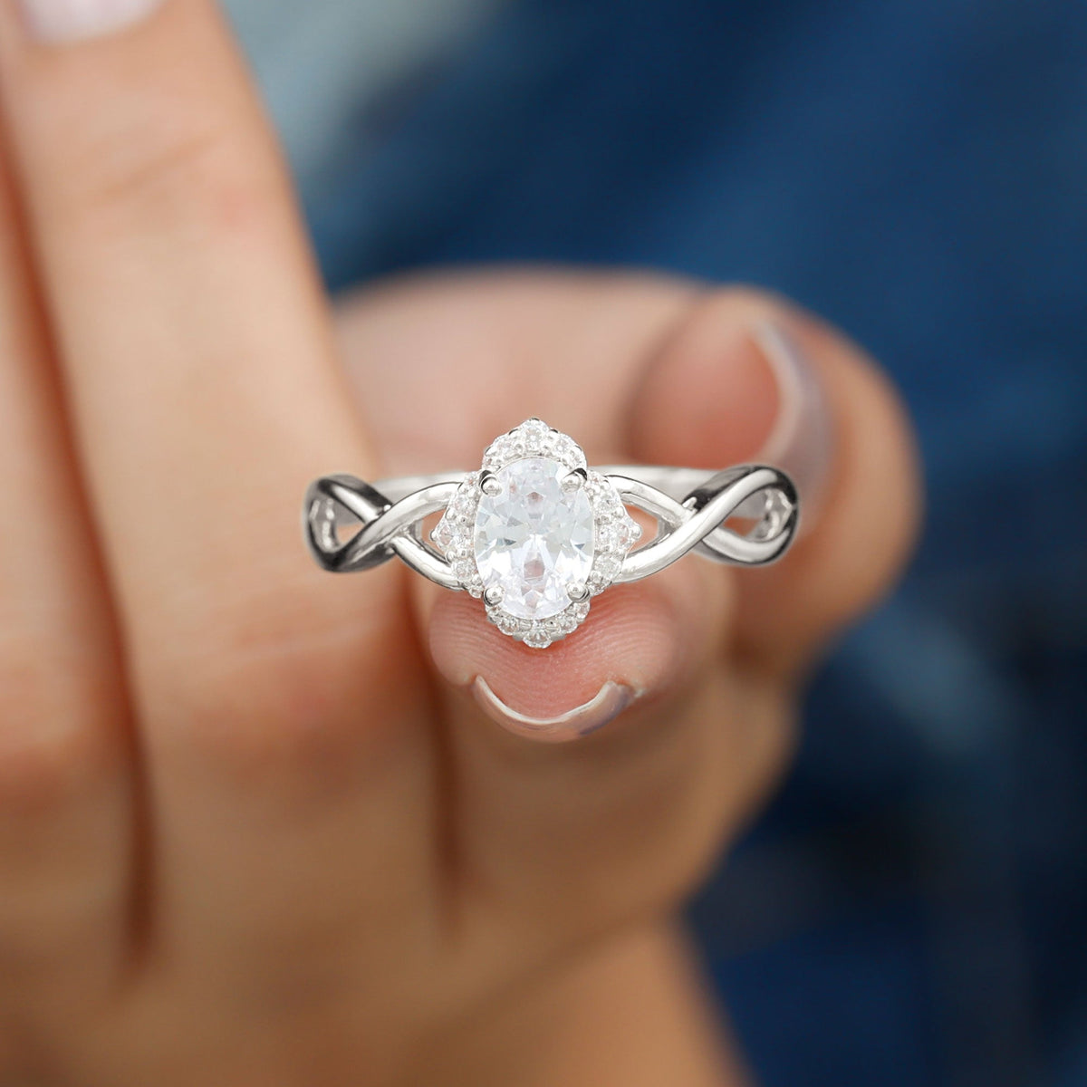 1.2 Carat Oval Cubic Zirconia Flower Engagement Ring in Crossover Shank