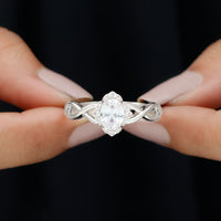 1.2 Carat Oval Cubic Zirconia Flower Engagement Ring in Crossover Shank