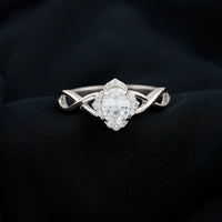 1.2 Carat Oval Cubic Zirconia Flower Engagement Ring in Crossover Shank
