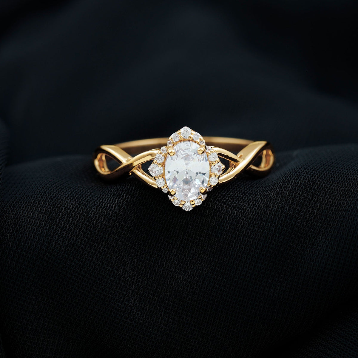1.2 Carat Oval Cubic Zirconia Flower Engagement Ring in Crossover Shank