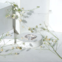 Rosec Jewels 1.25 CT princess cut cubic zirconia crossover engagement ring with sparkling stones and sleek band design.