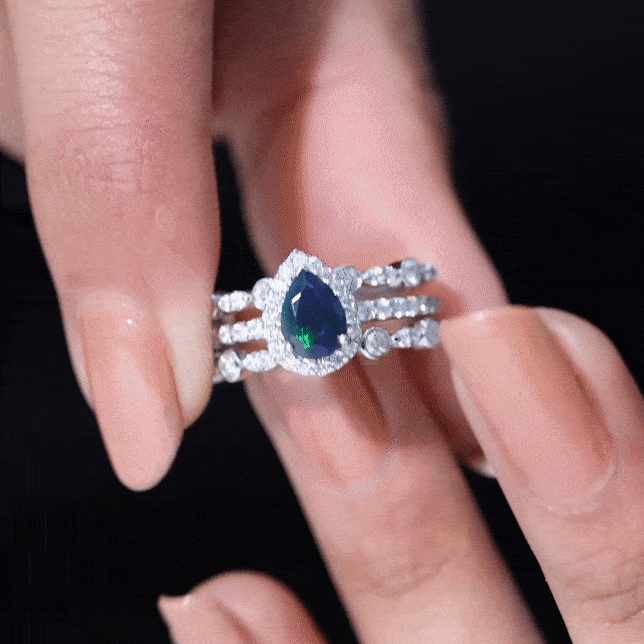Yellow gold 0.7 carat pear cut black opal trio wedding ring set with sparkling moissanite accents by Rosec Jewels