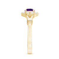 Amethyst and diamond halo split shank ring from Rosec Jewels, featuring a central gemstone surrounded by sparkling diamonds.