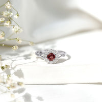 Real pink tourmaline and diamond engagement ring in split shank design by Rosec Jewels, showcasing vibrant pink gemstone and sparkling diamonds.