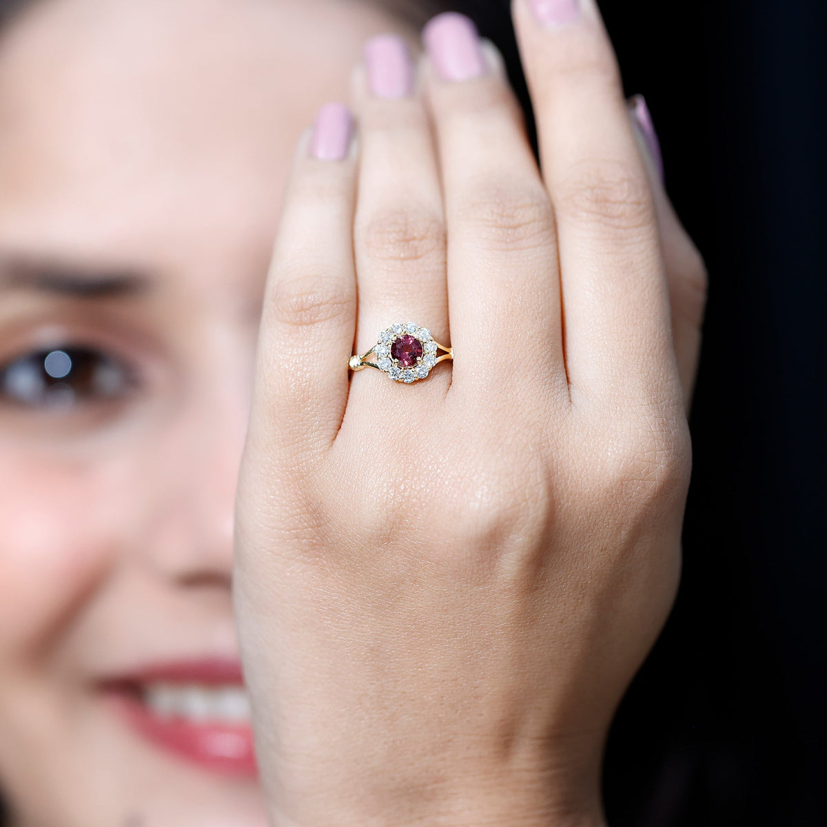 Pink tourmaline and diamond engagement ring in split shank design by Rosec Jewels, featuring vibrant pink gemstone and sparkling diamonds.