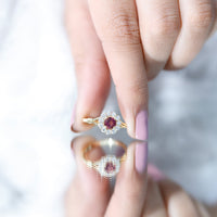 Pink tourmaline and diamond engagement ring in a split shank design by Rosec Jewels, featuring sparkling gemstones and elegant craftsmanship.