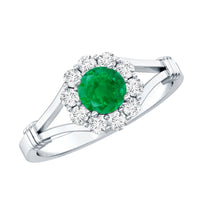 Emerald engagement ring with diamond halo, nature-inspired design, by Rosec Jewels, featuring a central emerald gemstone and intricate detailing.