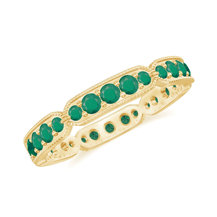 Natural emerald eternity wedding band by Rosec Jewels featuring milgrain detail and continuous emerald gemstone setting.
