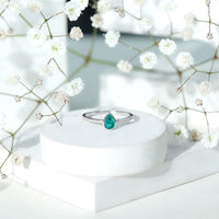 Pear Shaped Emerald Engagement Ring with Diamond Side Stones