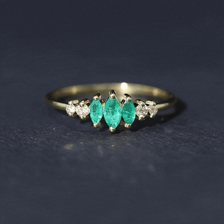 Marquise emerald and diamond 3-stone anniversary ring for women by Rosec Jewels, featuring a yellow gold band and elegant gemstone setting.