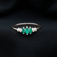 Rosec Jewels marquise emerald and diamond 3-stone anniversary ring for women, showcasing sparkling gemstones and elegant design.