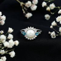 Rosec Jewels 8mm freshwater cultured pearl engagement ring with blue topaz, featuring elegant gemstone setting and detailed design.