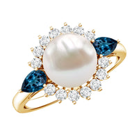 Rosec Jewels 8mm freshwater cultured pearl and blue topaz engagement ring showing the elegant pearl centerpiece and sparkling gemstone accents.