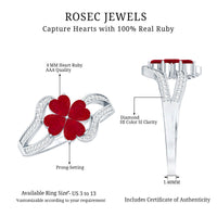 Real ruby flower engagement ring with diamond split shank by Rosec Jewels, featuring a vibrant ruby flower and sparkling diamond accents.