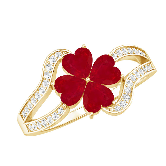 Elegant engagement ring featuring a real ruby flower centerpiece and diamond split shank by Rosec Jewels.