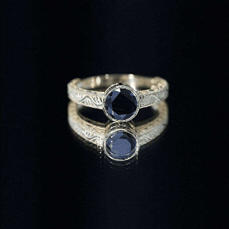 Vintage style 2 carat lab-grown black diamond bezel set engagement ring by Rosec Jewels, showcasing the elegant ring design.