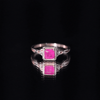 Natural 0.8 carat princess cut ruby promise ring with Celtic knot design by Rosec Jewels, showcasing a detailed gemstone and intricate band.