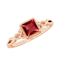 Natural 0.8 carat princess cut ruby promise ring with Celtic knot design, crafted by Rosec Jewels, featuring a detailed gold band.