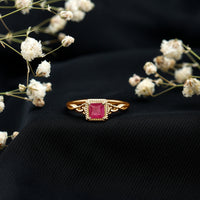Natural 0.8 carat princess cut ruby promise ring with Celtic knot design, crafted by Rosec Jewels.