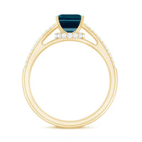 Rosec Jewels 6x8mm London Blue Topaz side stone engagement ring with diamond accents, showcasing a stunning emerald cut gemstone.