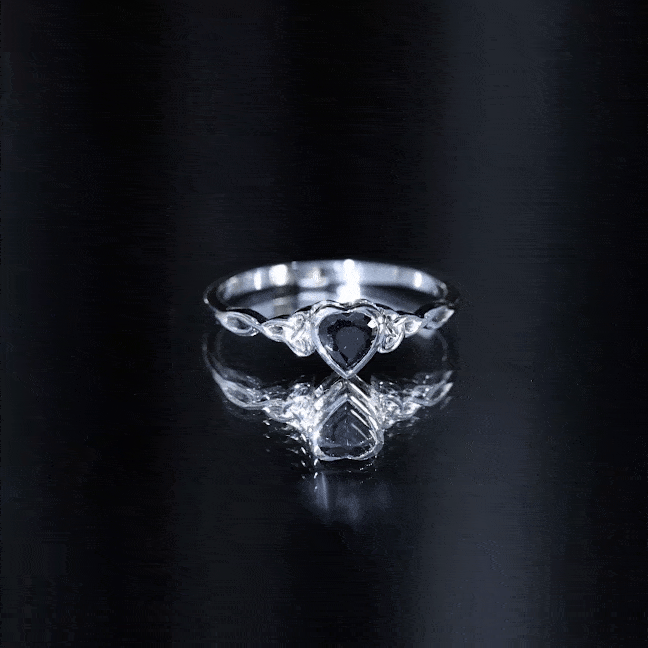 Yellow gold ring featuring a 0.6 carat lab-grown black diamond heart with Celtic knot design by Rosec Jewels.