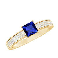 Rosec Jewels 5mm princess cut lab-created blue sapphire promise ring with diamond accent, showcasing a sparkling blue gemstone and elegant band.