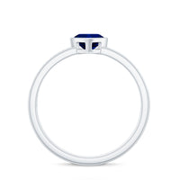 Blue sapphire heart solitaire engagement ring with pave diamond accents by Rosec Jewels, showcasing a sparkling blue gemstone and elegant design.