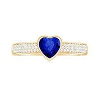 Heart Shape Created Blue Sapphire Solitaire Ring with Diamond Side Stone