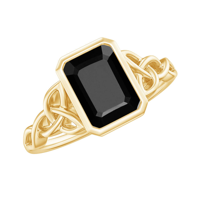 Emerald cut black onyx engagement ring with bezel setting and a surprise diamond accent by Rosec Jewels, showcasing a sleek, elegant design.