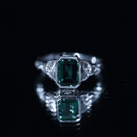 Certified Lab Grown Emerald Cut Emerald Engagement Ring with Celtic Knot