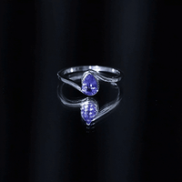Natural Tanzanite Solitaire Engagement Ring with Bypass Shank