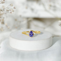 Natural Tanzanite Solitaire Engagement Ring with Bypass Shank