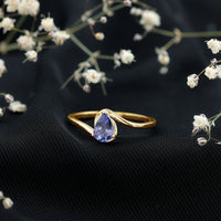 Natural Tanzanite Solitaire Engagement Ring with Bypass Shank