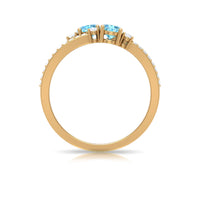 Natural aquamarine and diamond promise ring with split shank design by Rosec Jewels, showcasing the elegant two-stone setting.