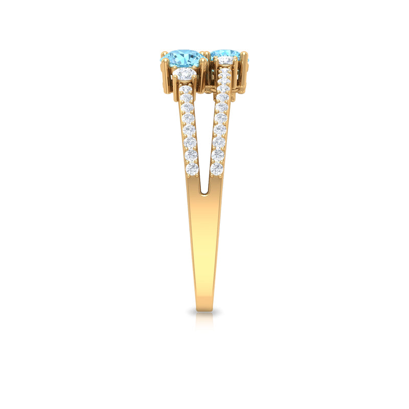 Natural aquamarine and diamond promise ring with split shank design by Rosec Jewels, showcasing elegant gemstone details.