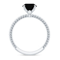 7x9mm oval cut black onyx solitaire engagement ring with diamond accent, crafted by Rosec Jewels.