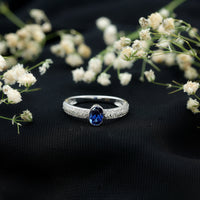 Certified 0.6 Carat Oval Lab Grown Blue Sapphire Engagement Ring with Diamond