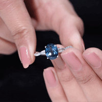 2.5 Carat Oval Cut London Blue Topaz Oblong Engagement Ring with Diamond